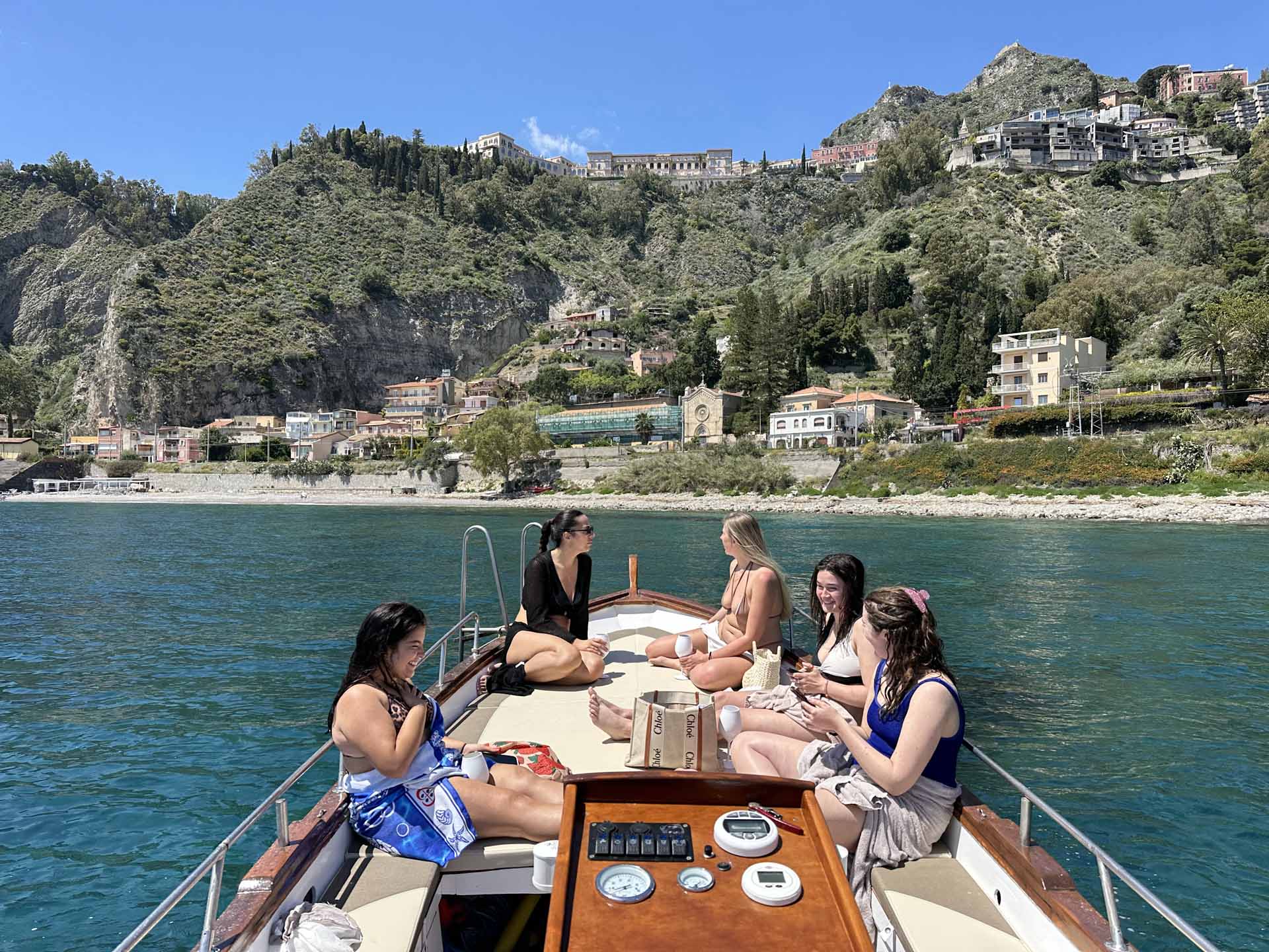 Panorama of Taormina from the private boat at sea