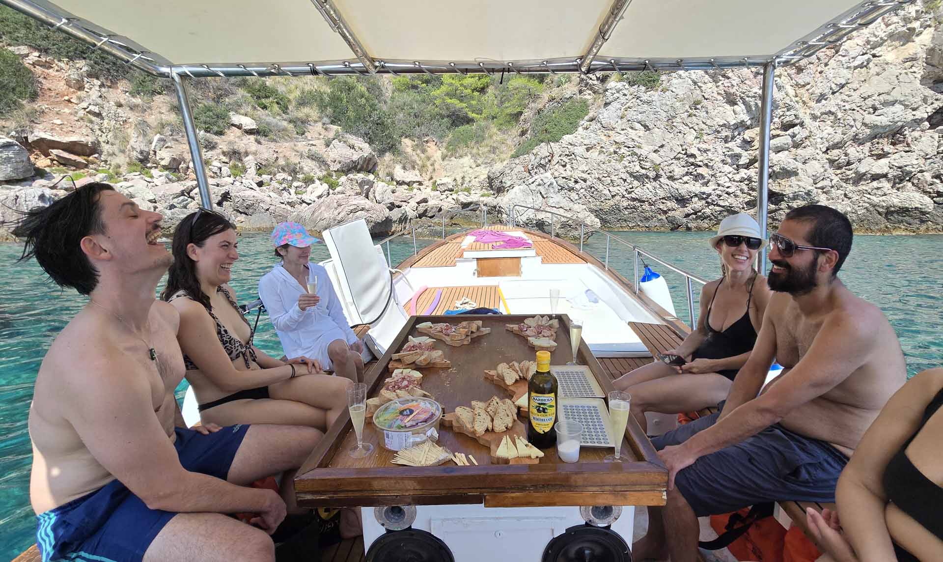 Platter of Sicilian cheeses and cured meats on the boat