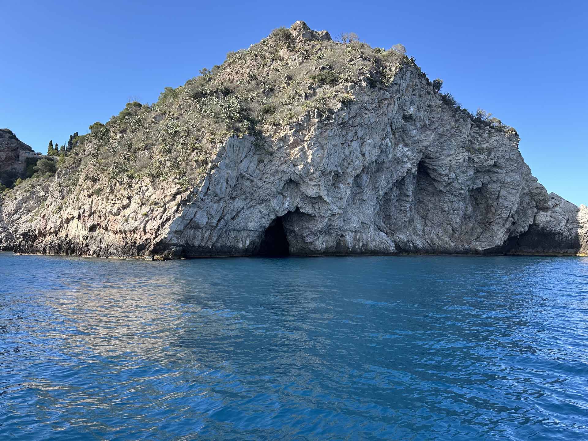 Swim stop in the clear waters of Taormina