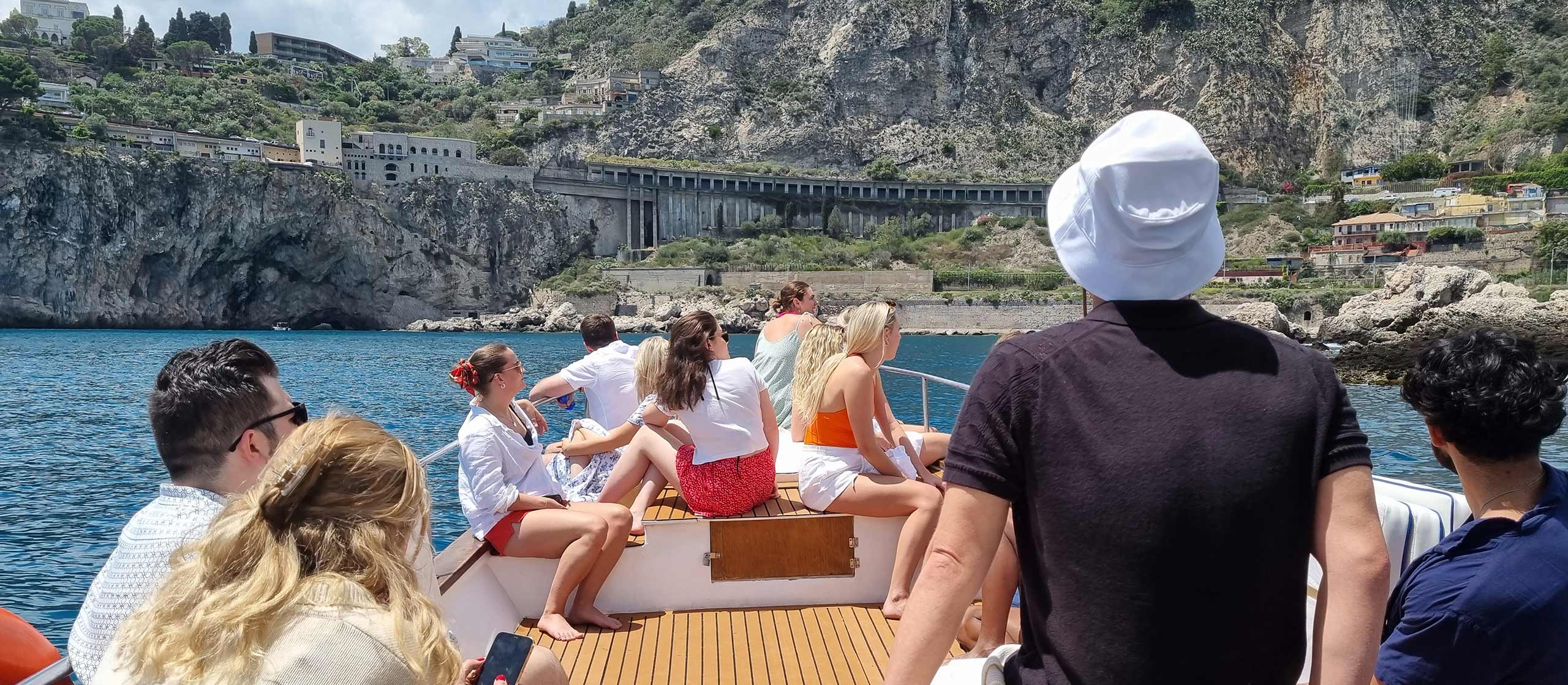 Wine tasting and Sicilian specialities aboard a Taormina boat tour